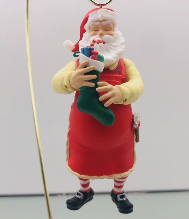 2023 Toymaker Santa Surprise - Mystery Ornament - <B>Red Apron with Green Stocking - Very Rare</B>