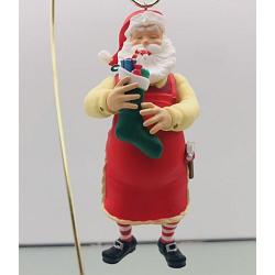 2023 Toymaker Santa Surprise - Mystery Ornament - <B>Red Apron with Green Stocking - Very Rare</B>